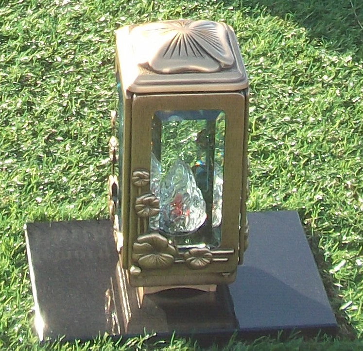 Bronze Eternal Light on Black Granite.JPG