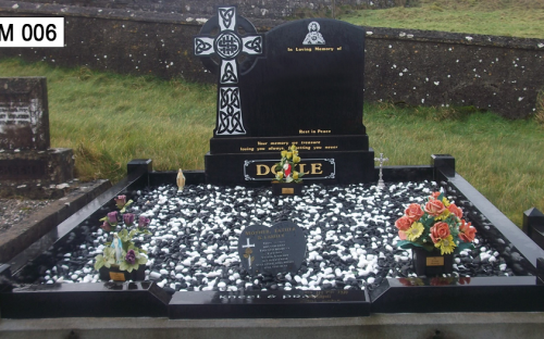 Gavins Memorials, Ballyhaunis, Co Mayo, Ireland.  Celtic Cross on side of Black Headstone 1 - GM 006